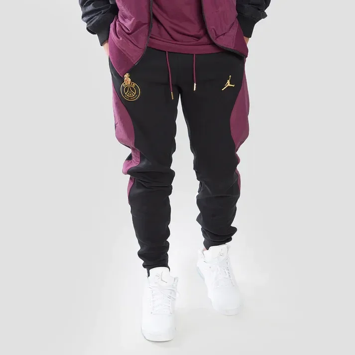 PANTALONI JORDAN X PSG FLEECE TRAVEL — foto 9
